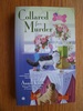 Collared for Murder: A Pet Botique Mystery