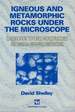 Igneous and Metamorphic Rocks Under the Microscope: Classification, Textures, Microtextures, and Mineral Preferred Orientations