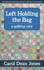 Left Holding the Bag: a Quilting Cozy (Volume 10)