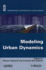 Modeling Urban Dynamics: Mobility, Accessibility and Real Estate Value