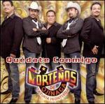 Qu�date Conmigo