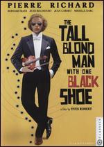 The Tall Blond Man with One Black Shoe