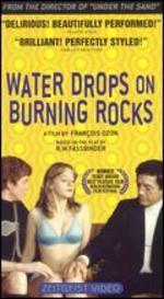 Water Drops On Burning Rocks